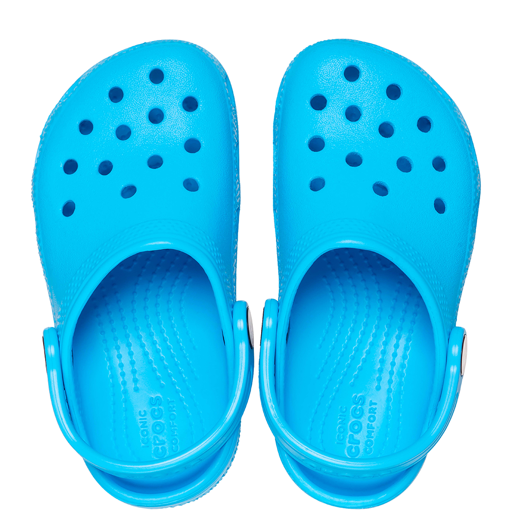 Top down view of pair of Crocs kids blue clogs with holes and strap at the back