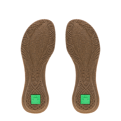 Tribal design with El Naturalista green frog logo on sole of pair of 413 shoes