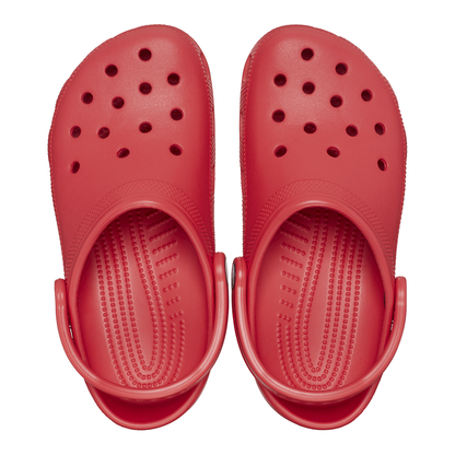 Pair of Crocs clogs in red with holes and stimulation nibs on footbed